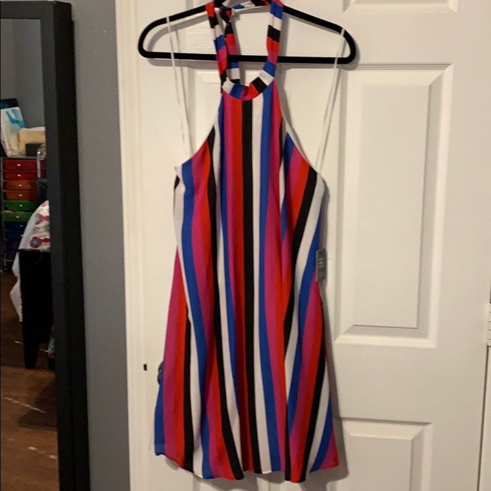 Open back high neck swing dress. With lining